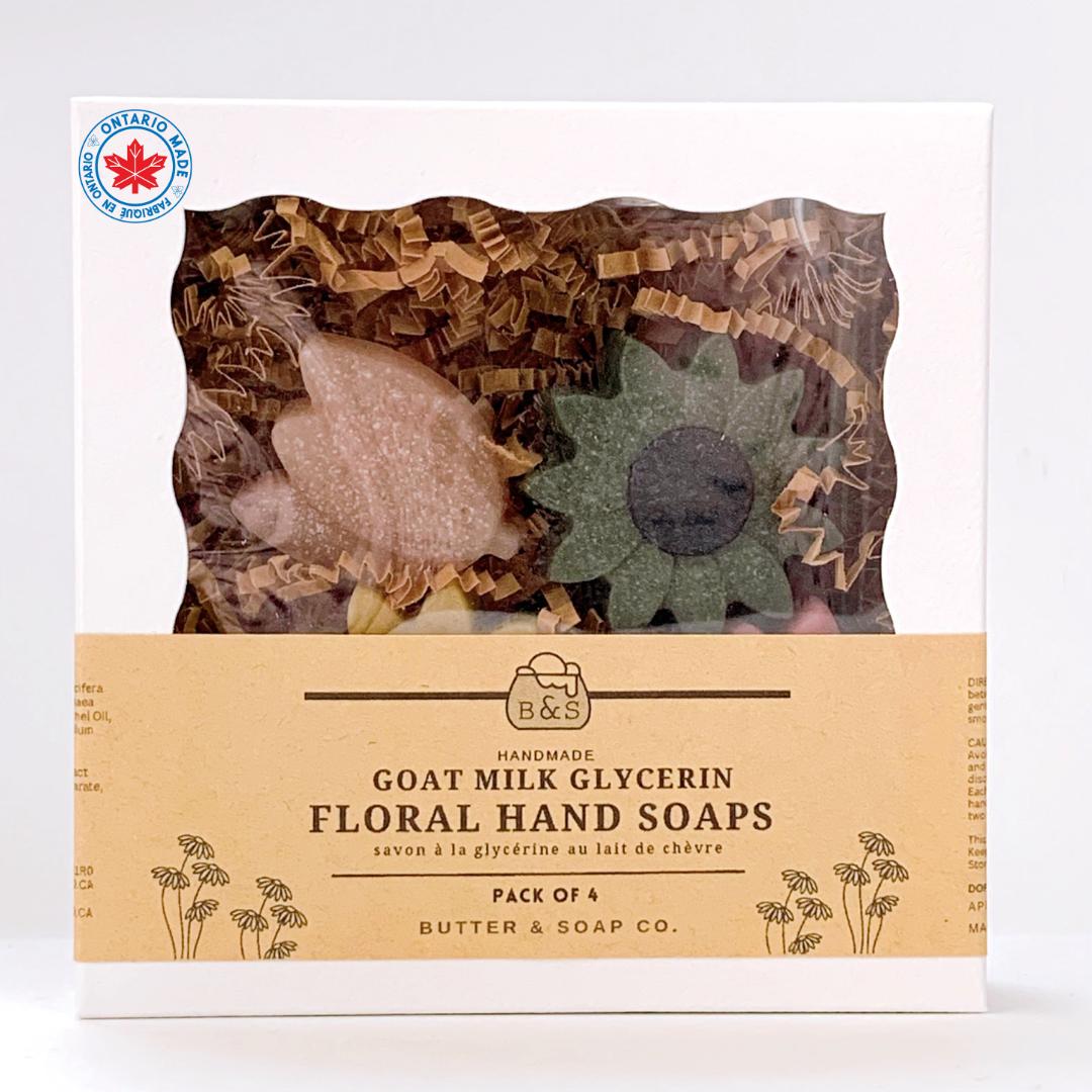 a box of 4 floral goat milk hand soaps with retail packaging